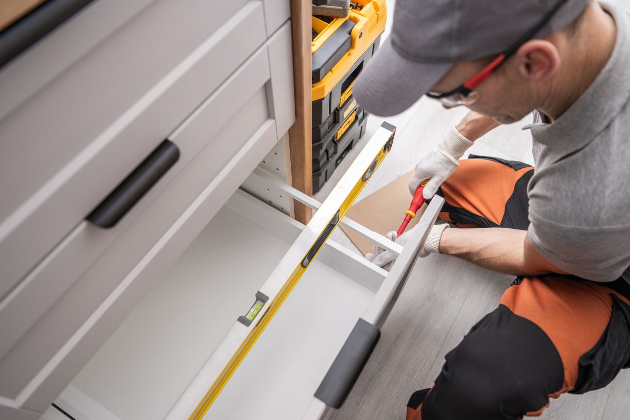 Cabinetmaker Contractor Installing Kitchen Cabinets
